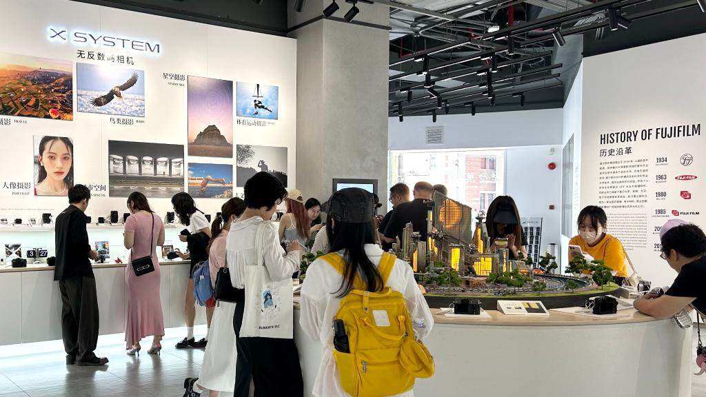 Snap, share, sell: influencer economy revives camera market in China