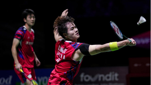 Guangzhou athlete Liang Weikeng, partnering with Wang Chang, came second in badminton men's doubles