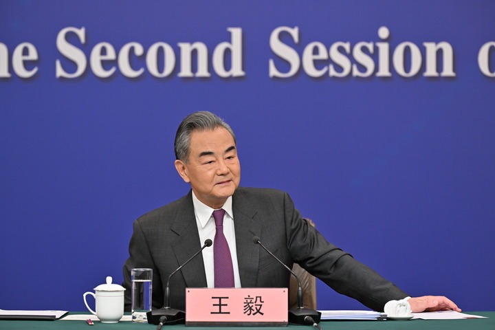 Chinese Foreign Minister Wang Yi, also a member of the Political Bureau of the Communist Party of China Central Committee, attends a press conference on China's foreign policy and foreign relations on the sidelines of the second session of the 14th National People's Congress (NPC) in Beijing, capital of China, March 7, 2024. (Xinhua/Cai Yang)