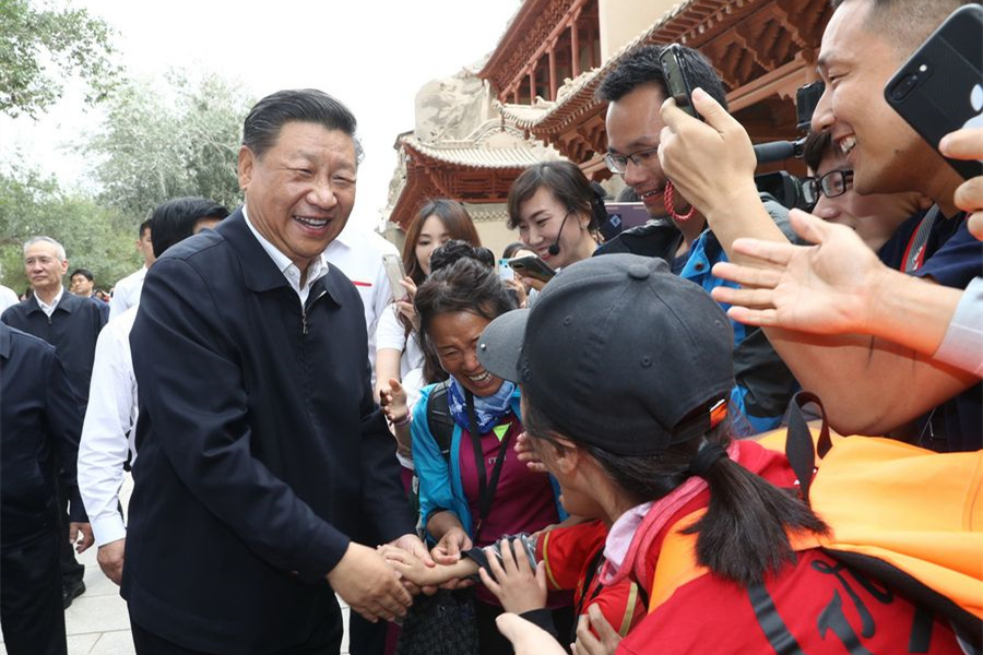 Xi highlights poverty relief, high-quality development, environmental protection