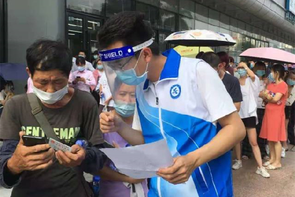 HK, Macao volunteers assist epidemic control at Nansha