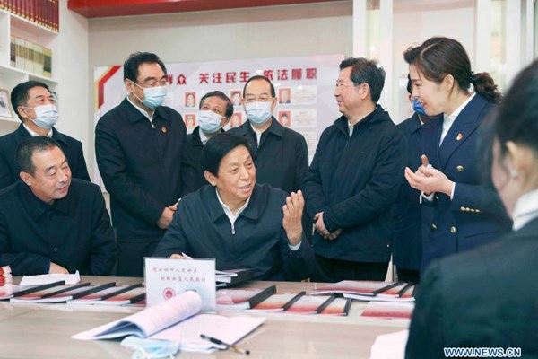 Top legislator stresses implementing Xi Jinping Thought on the Rule of Law