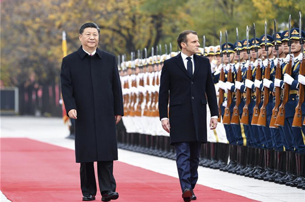 Xi holds talks with Macron, pledging for enhanced China-France ties