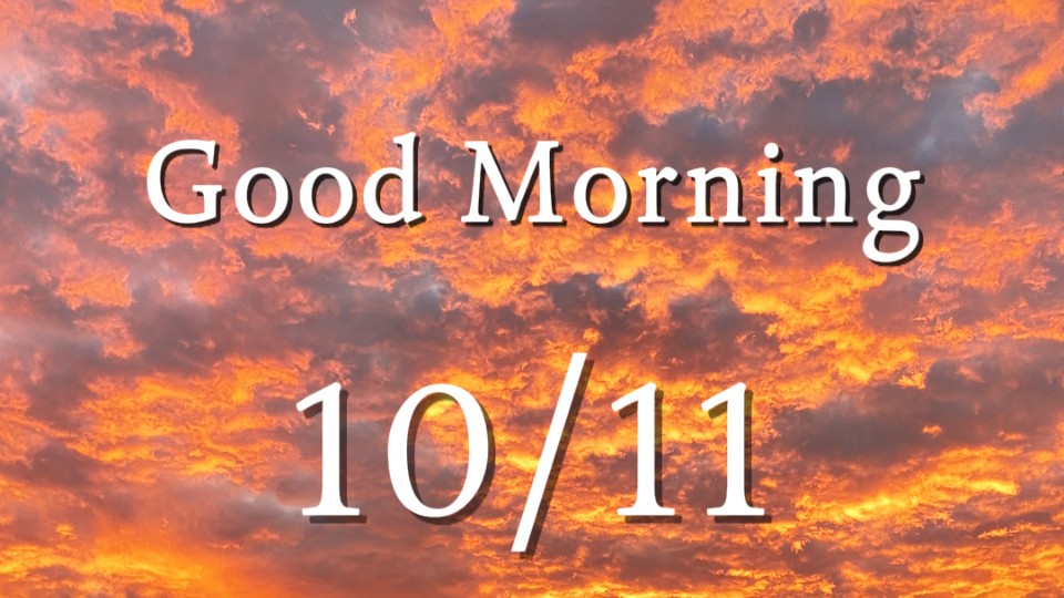 Clouds roll like golden waves as dawn breaks
