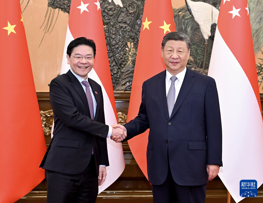 　　6月24日上午，国家主席习近平在北京人民大会堂会见来华进行正式访问的新加坡总理黄循财。新华社记者 岳月伟 摄