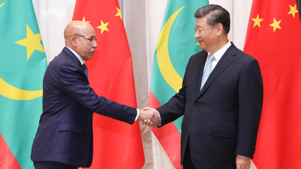 习近平会见毛里塔尼亚总统加兹瓦尼